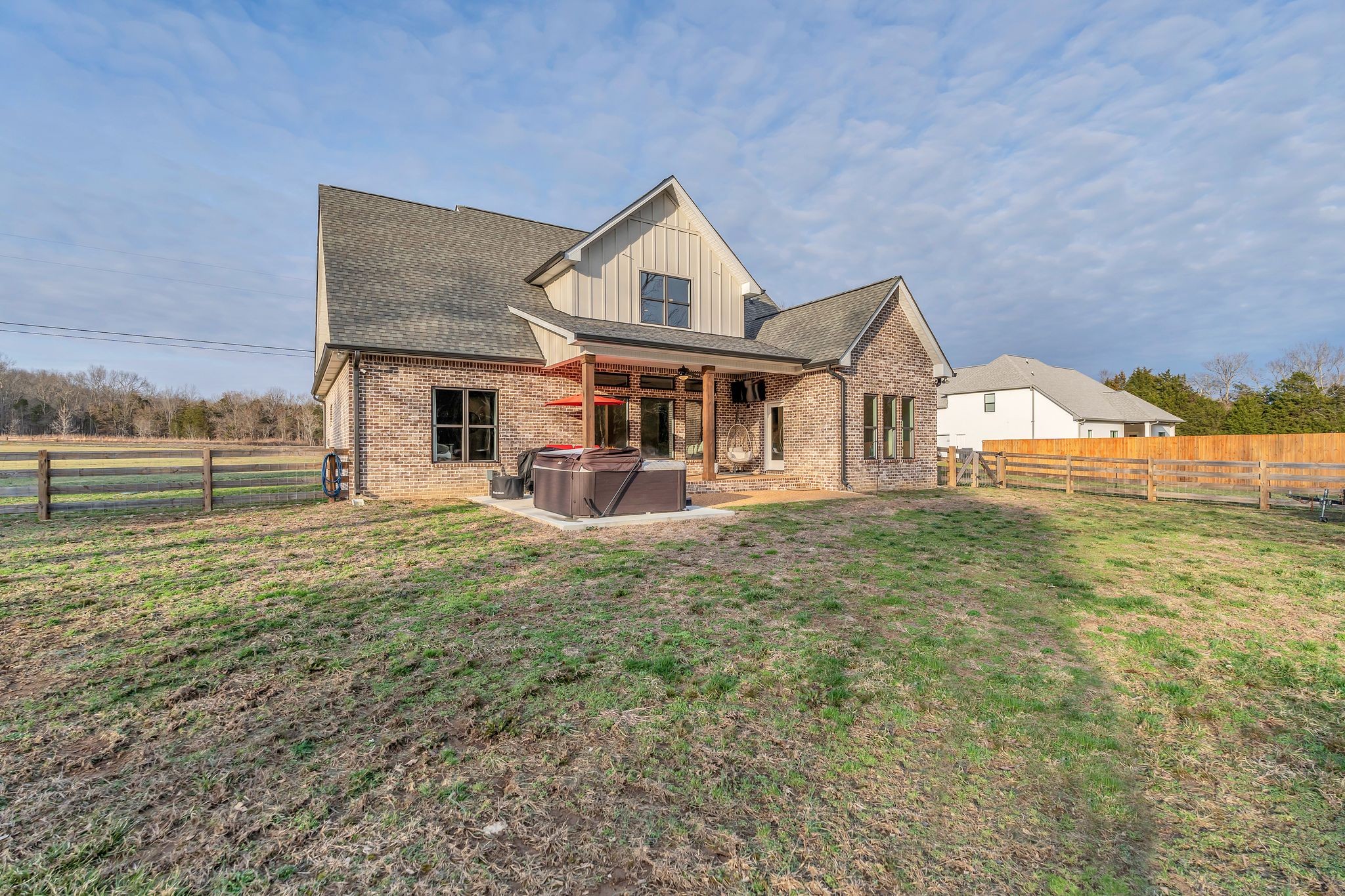 6655 Simmons Bluff Road Lebanon, TN 37090 - Photo 30 of 32 a front view of a house with a garden and plants