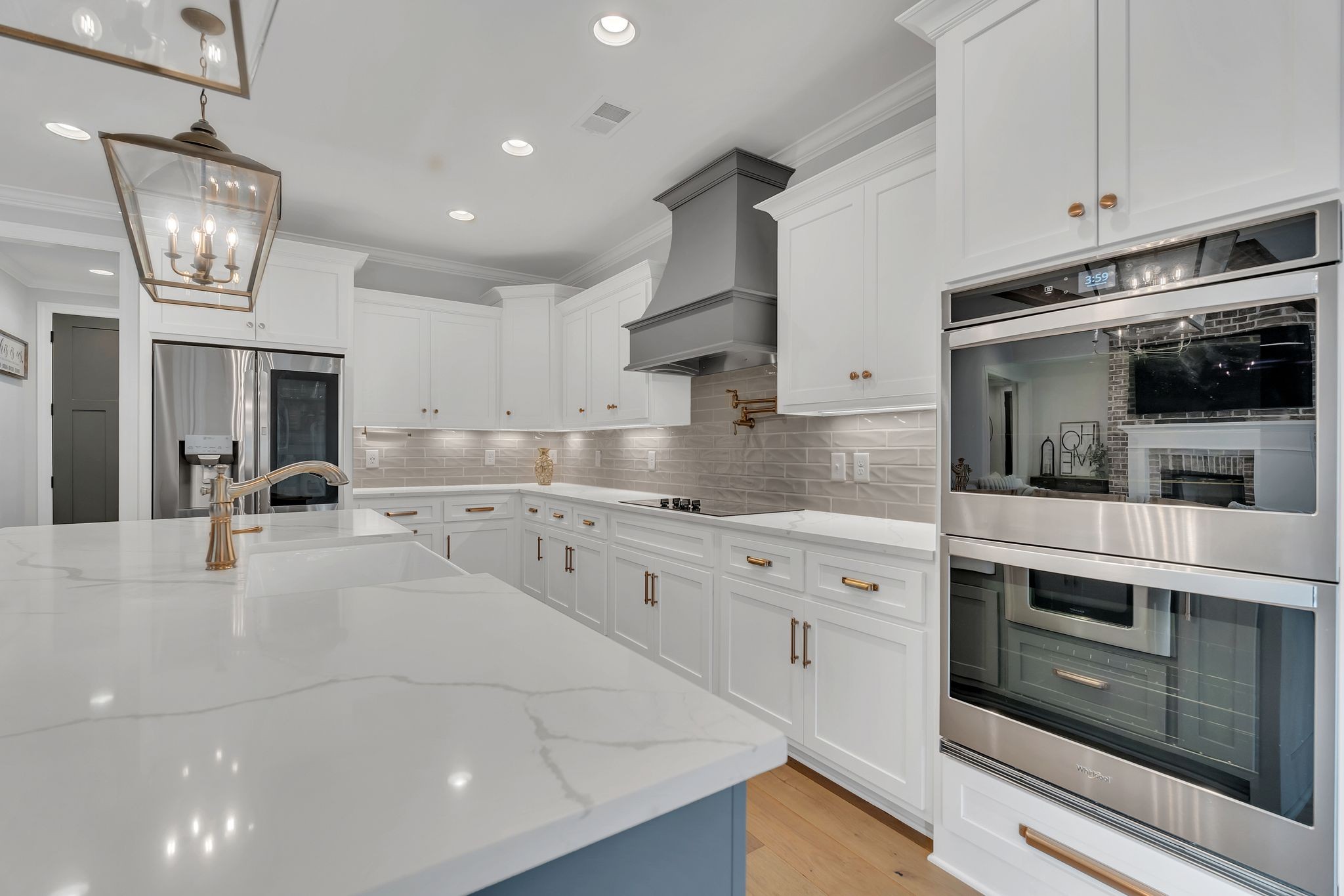 6655 Simmons Bluff Road Lebanon, TN 37090 - Photo 10 of 32 a large kitchen with stainless steel appliances granite countertop a stove and a sink