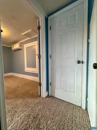 a view of hallway with stairs