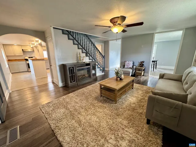 a view of a work space with furniture and window