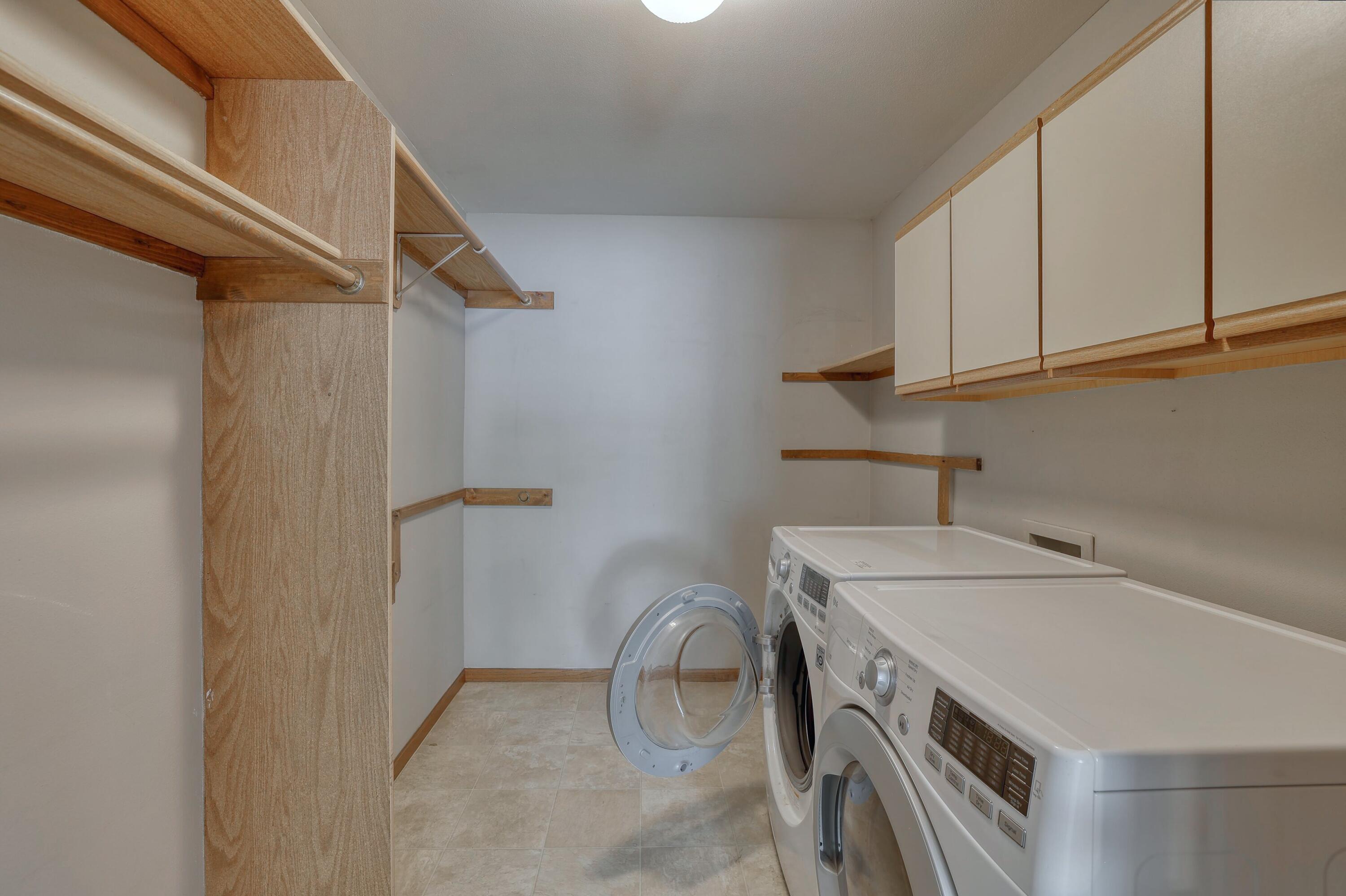 4875 Easy Street, Unit 5 Delafield, WI 53029 - Photo 19 of 29 Walk-In Closet & Laundry