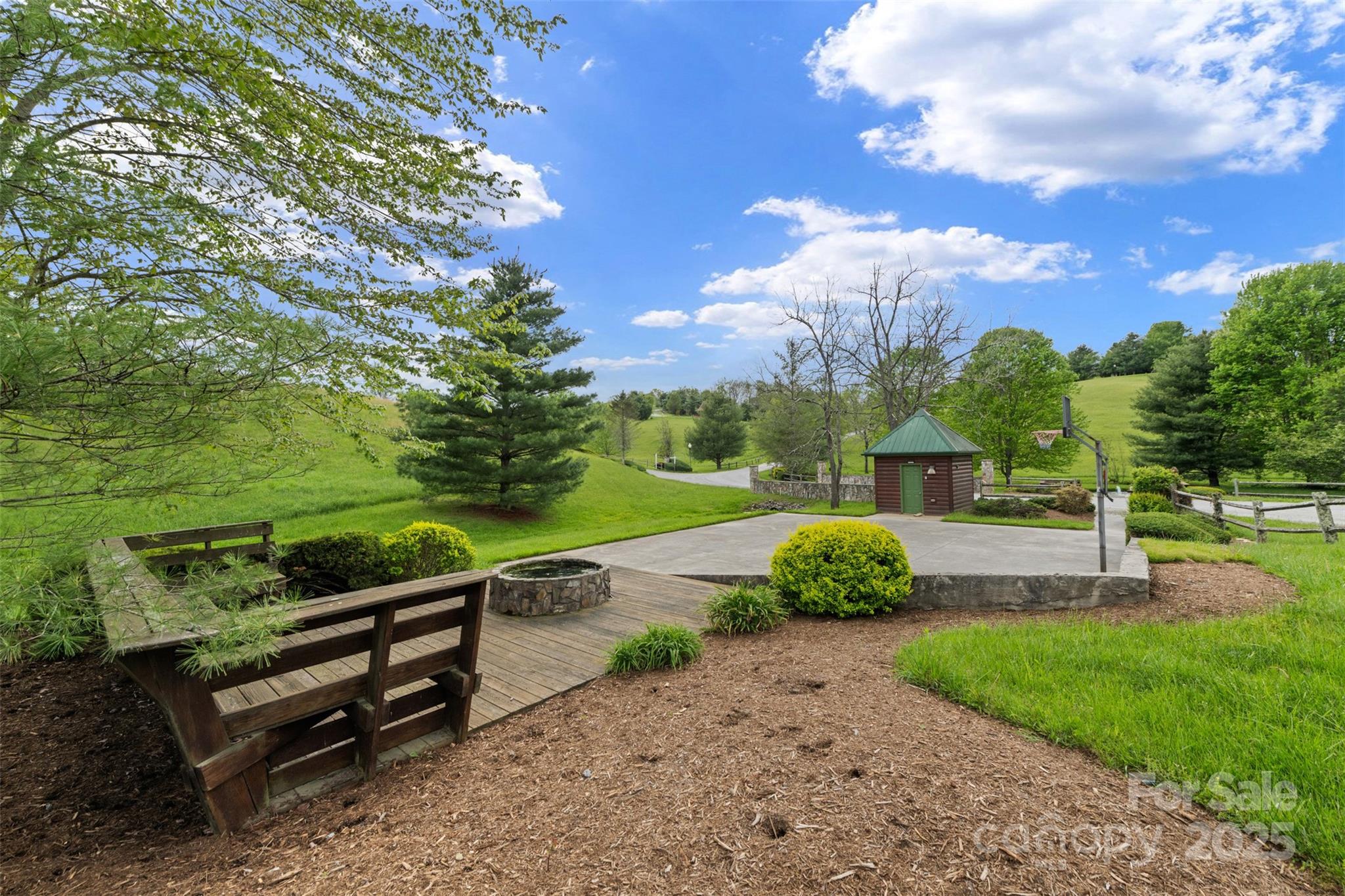 29 Pond View Lane, Unit 29 Sparta, NC 28675 - Photo 9 of 30 a view of a bench in a garden