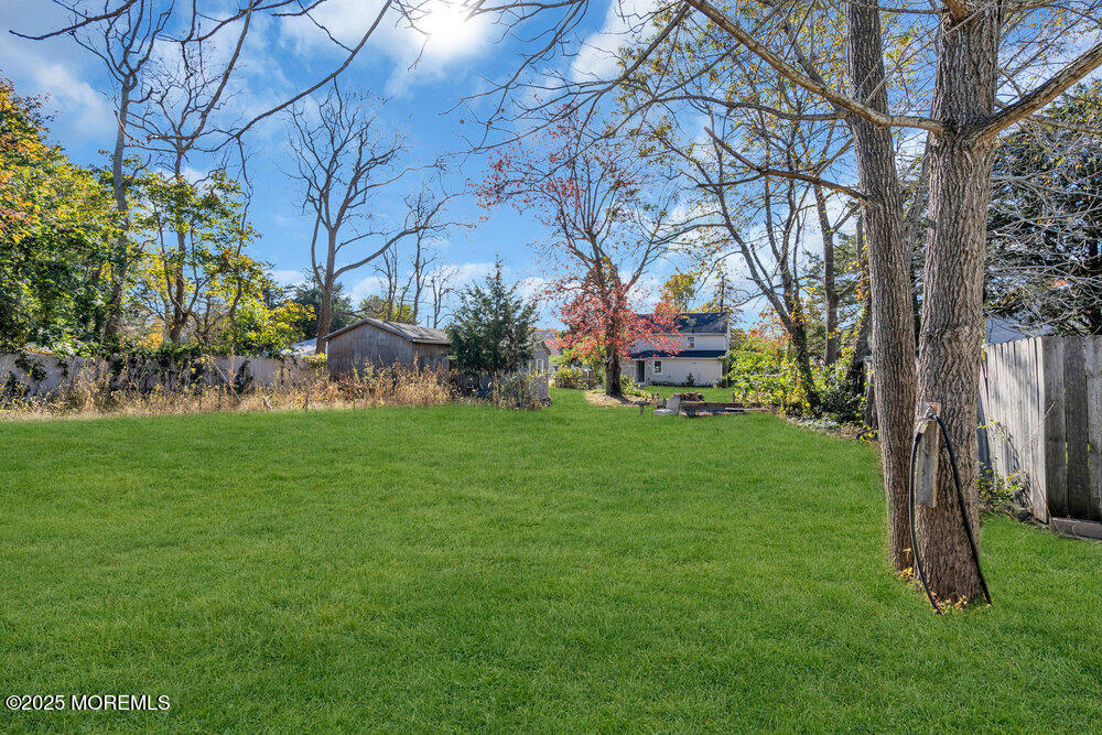 22 Lacey Road Forked River, NJ 08731 - Photo 18 of 24 a front view of a house with garden