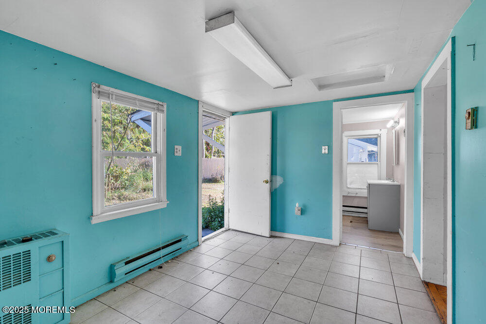 22 Lacey Road Forked River, NJ 08731 - Photo 3 of 24 a view of an empty room with closet and a window