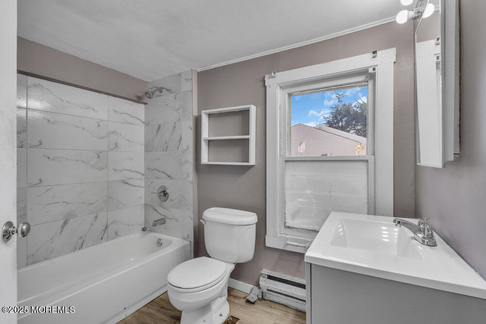 22 Lacey Road Forked River, NJ 08731 - Photo 7 of 24 a bathroom with a sink toilet and shower