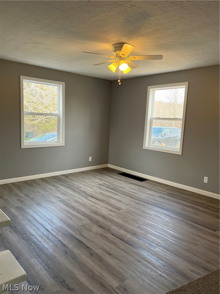 3749 Mann Road Ashtabula, OH 44004 - Photo 7 of 34 Living room 18 x 10 with new laminate flooring.