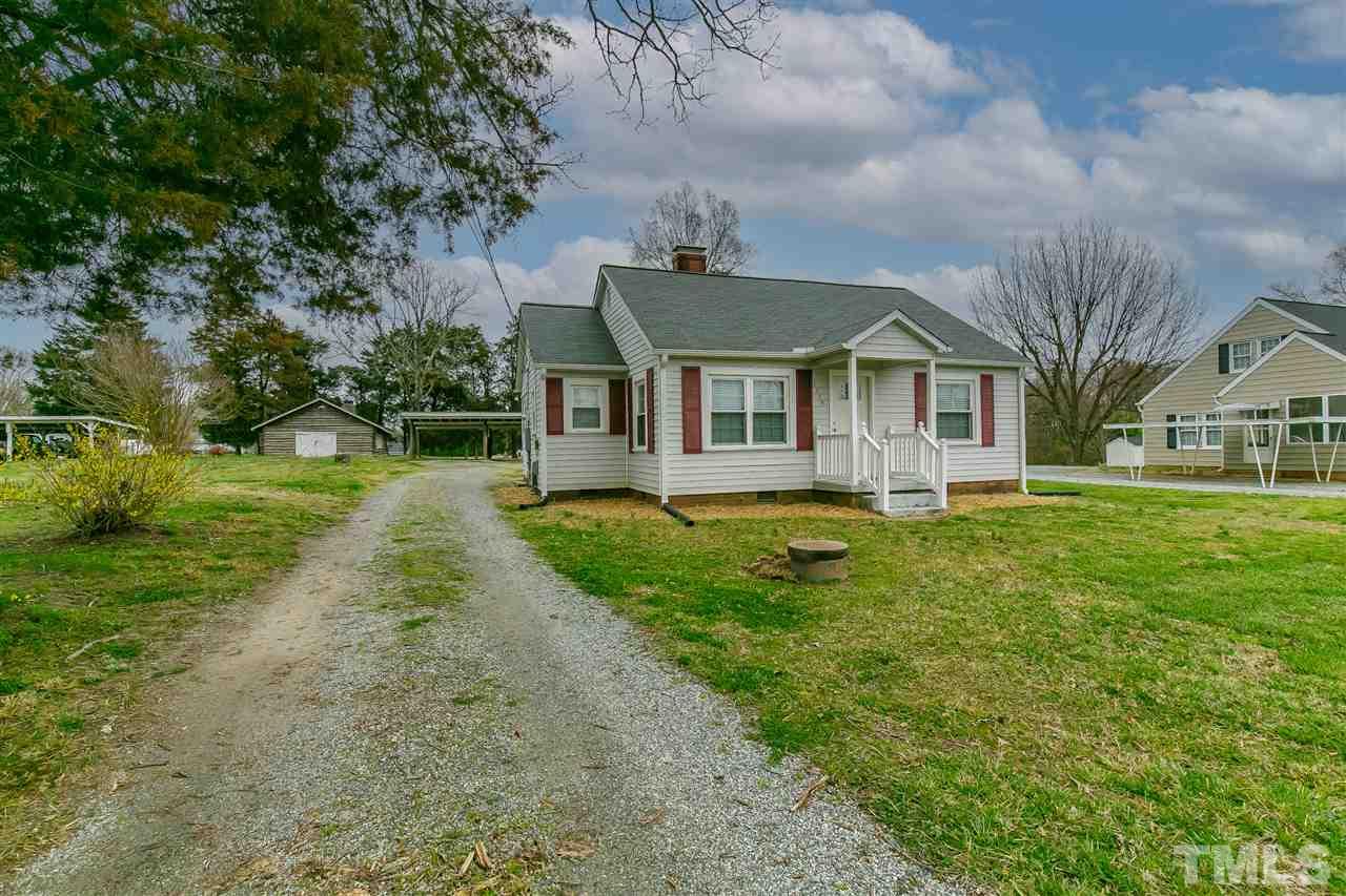 2779 Union Ridge Road Burlington, NC 27217 - Photo 4 of 28 Long gravel drive leads to carport in rear