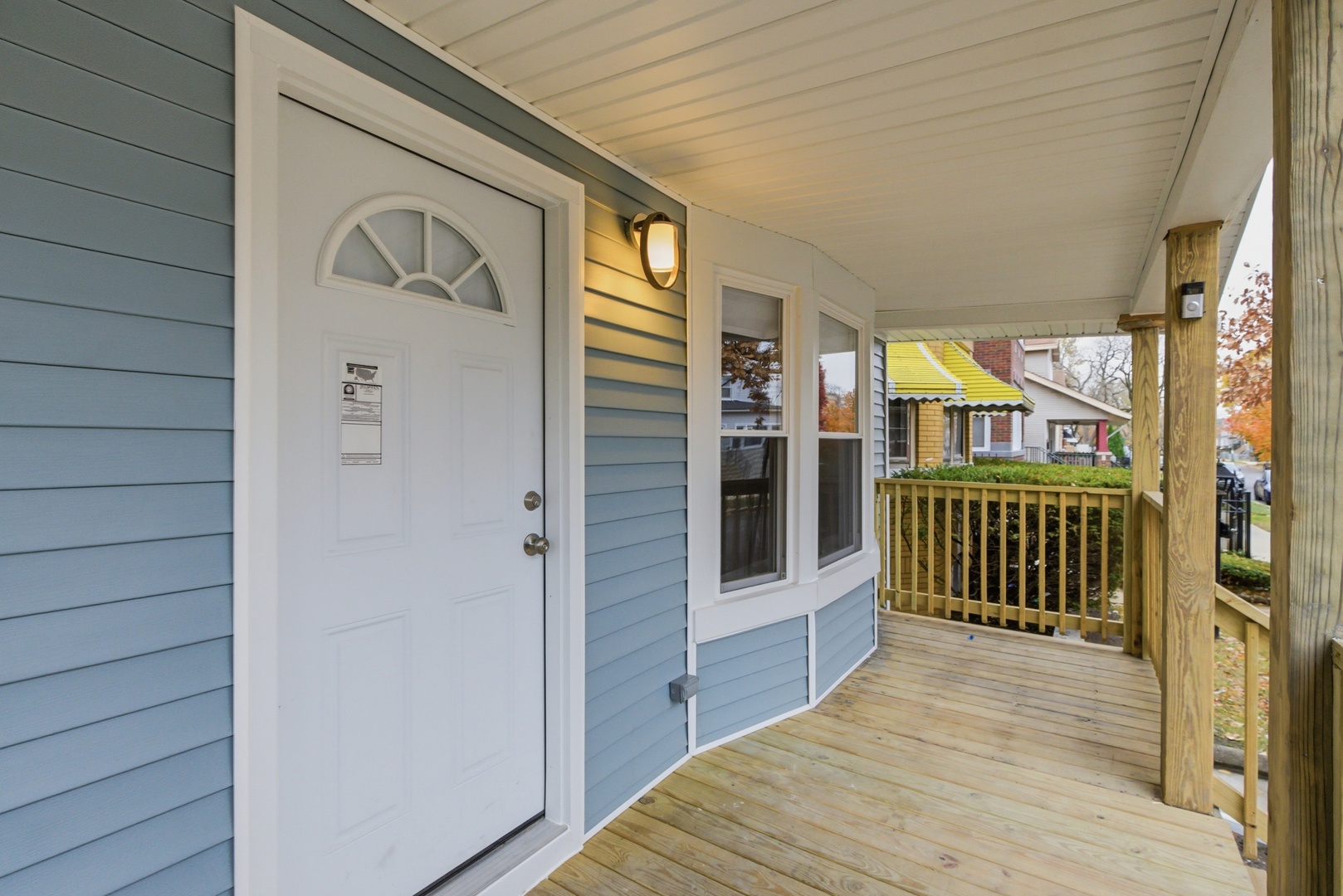 8327 South Morgan Street Chicago, IL 60620 - Photo 2 of 42 a view of a porch with wooden floor and outdoor space