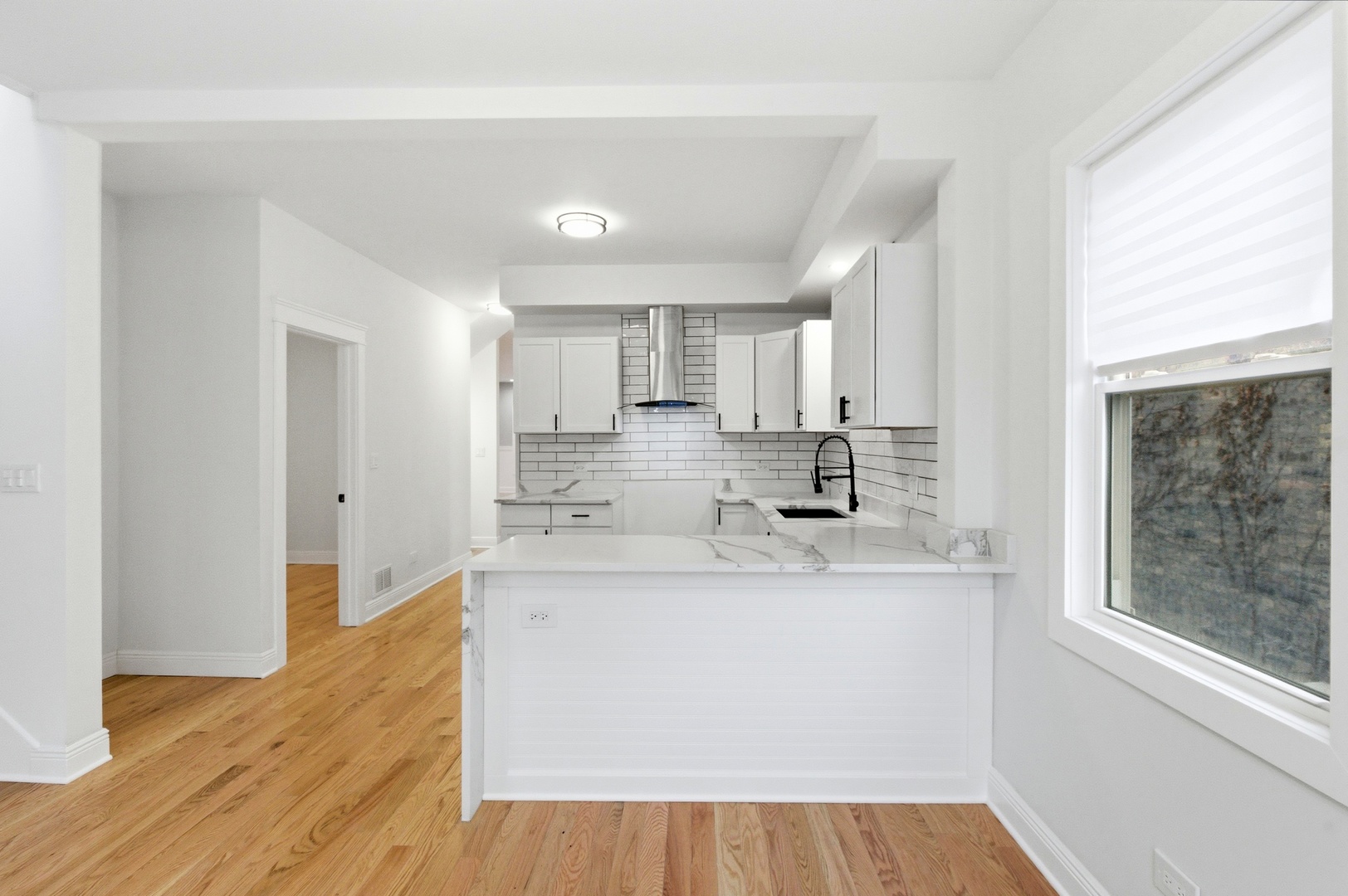 8327 South Morgan Street Chicago, IL 60620 - Photo 21 of 46 a large kitchen with stainless steel appliances a sink and a refrigerator