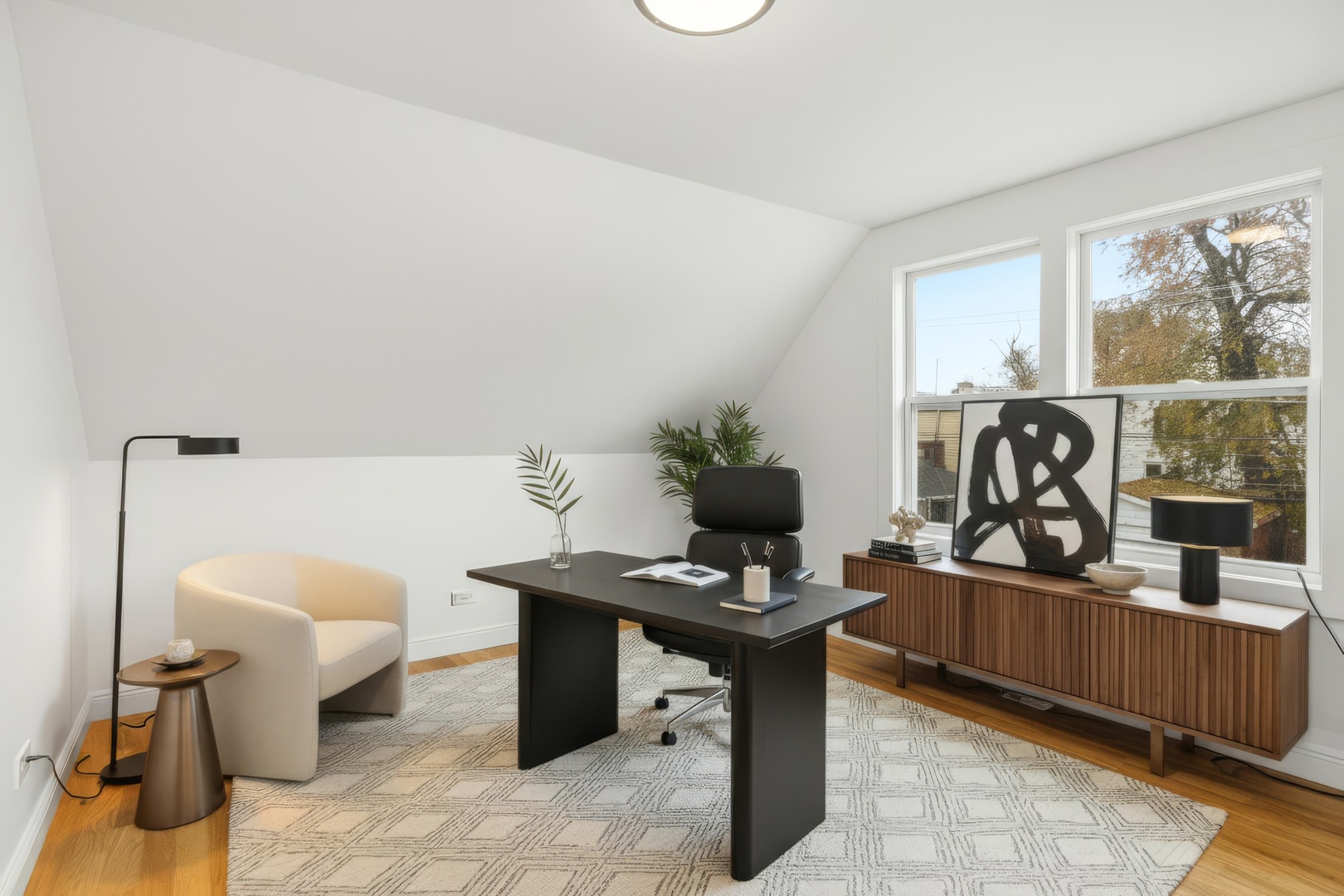 8327 South Morgan Street Chicago, IL 60620 - Photo 24 of 46 a view of a workspace with furniture and a window