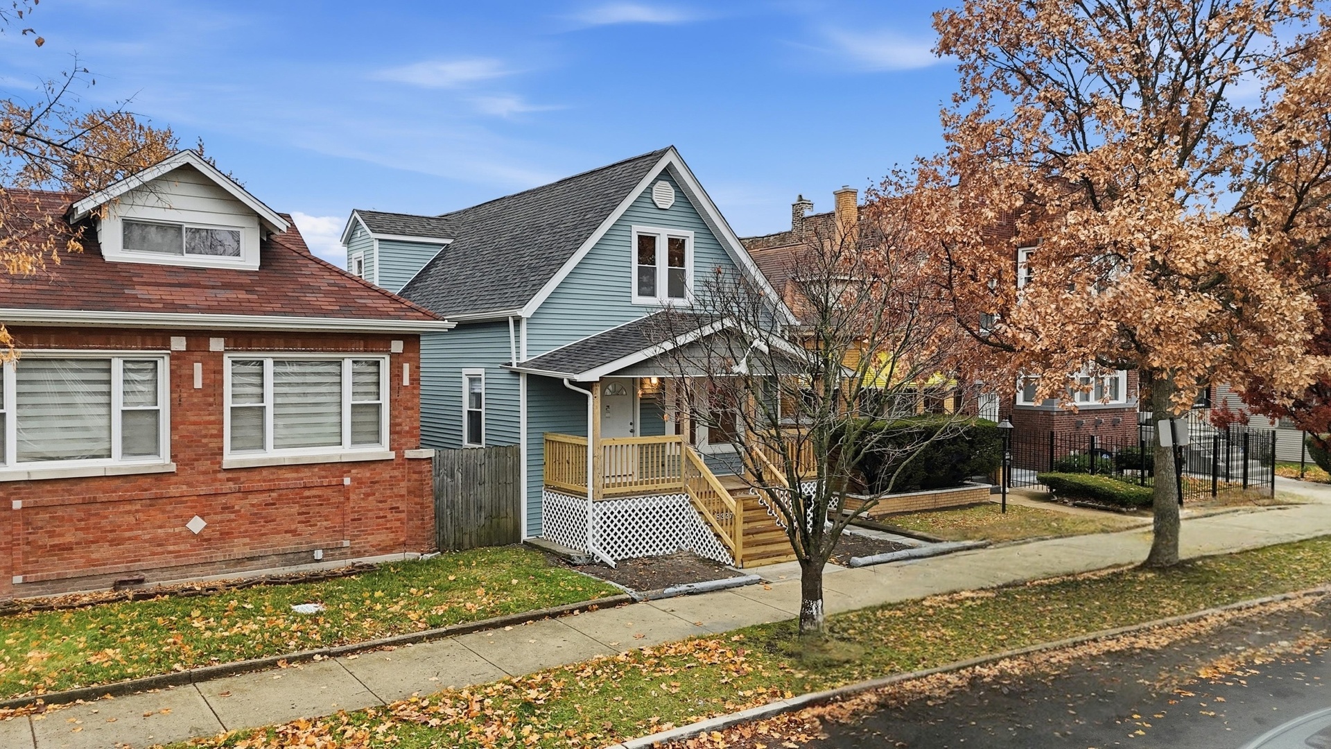 8327 South Morgan Street Chicago, IL 60620 - Photo 38 of 42 a front view of a house with a yard