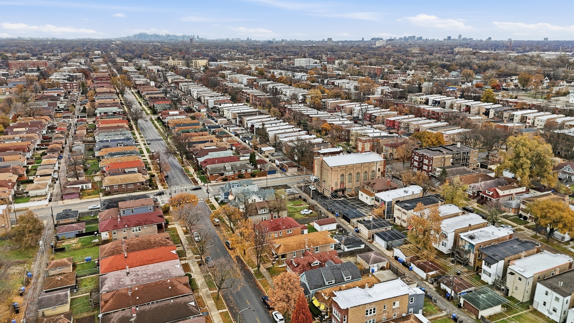 8327 South Morgan Street Chicago, IL 60620 - Photo 40 of 46 an aerial view of residential houses with city view