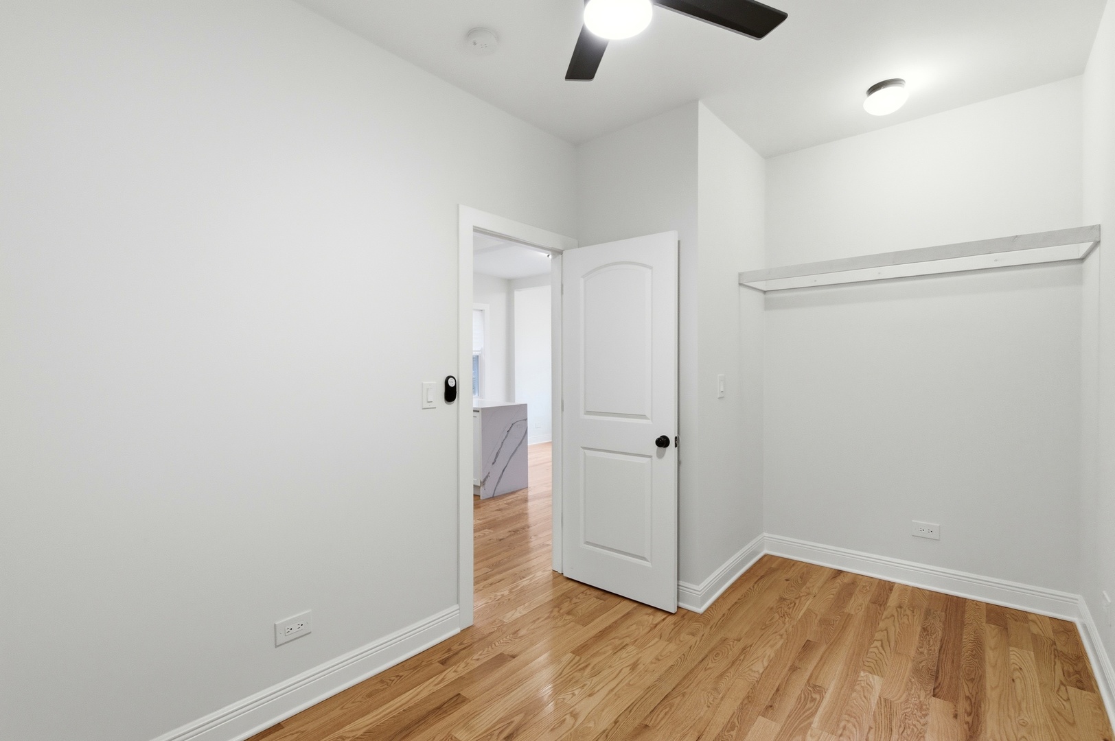 8327 South Morgan Street Chicago, IL 60620 - Photo 10 of 42 an empty room with closet and a ceiling fan