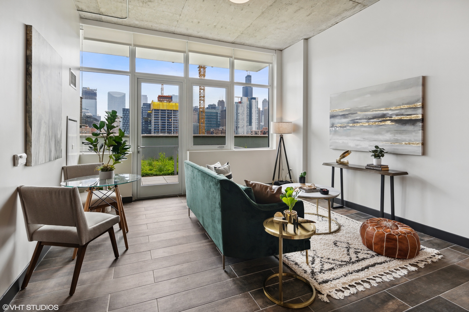 171 North Aberdeen Street, Unit 607 Chicago, IL 60607 - Photo 3 of 20 a living room with furniture and a potted plant