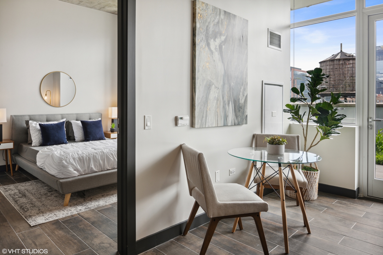 171 North Aberdeen Street, Unit 607 Chicago, IL 60607 - Photo 6 of 20 a living room with furniture and a potted plant