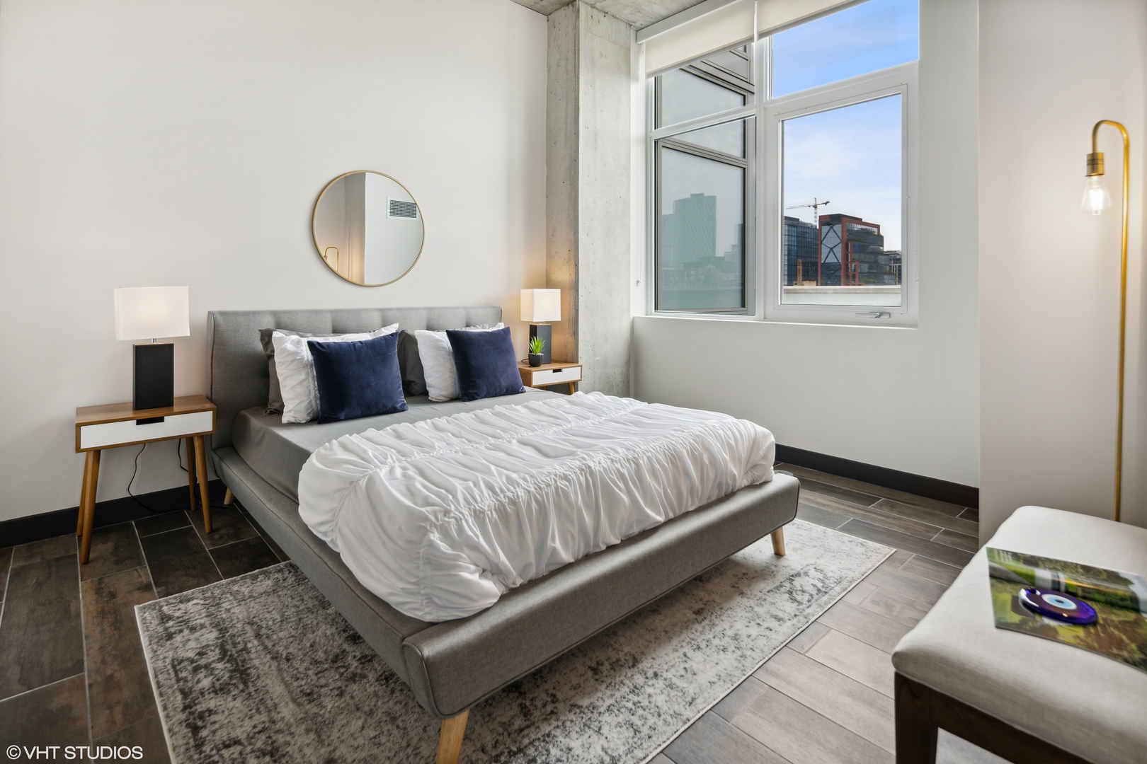 171 North Aberdeen Street, Unit 607 Chicago, IL 60607 - Photo 7 of 20 a bedroom with bed and a window