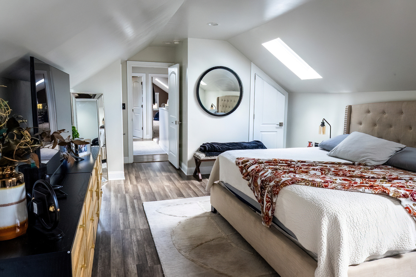 1911 Ridgeland Avenue Berwyn, IL 60402 - Photo 12 of 21 a spacious bedroom with a bed and a large mirror with wooden floor