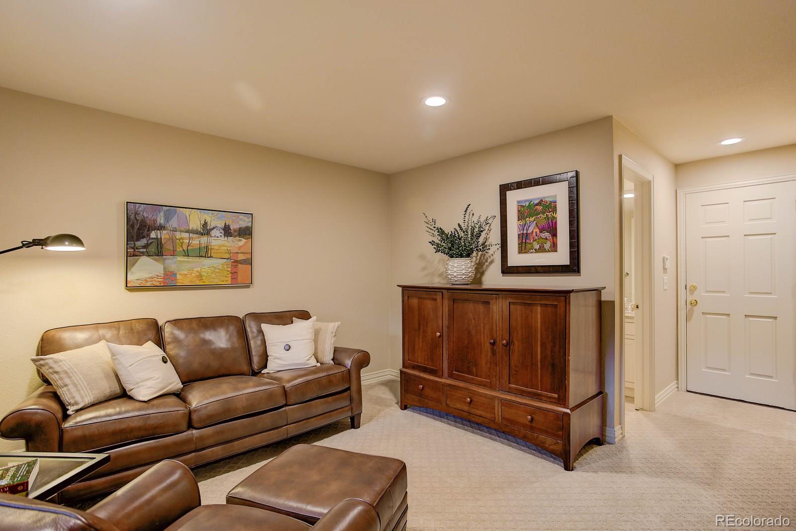 2 Garfield Street, Unit B Denver, CO 80206 - Photo 20 of 24 a living room with furniture and a window