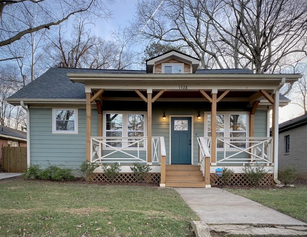 1528 Richland Road Southwest Atlanta, GA 30311 - Photo 1 of 1 a front view of a house with garden