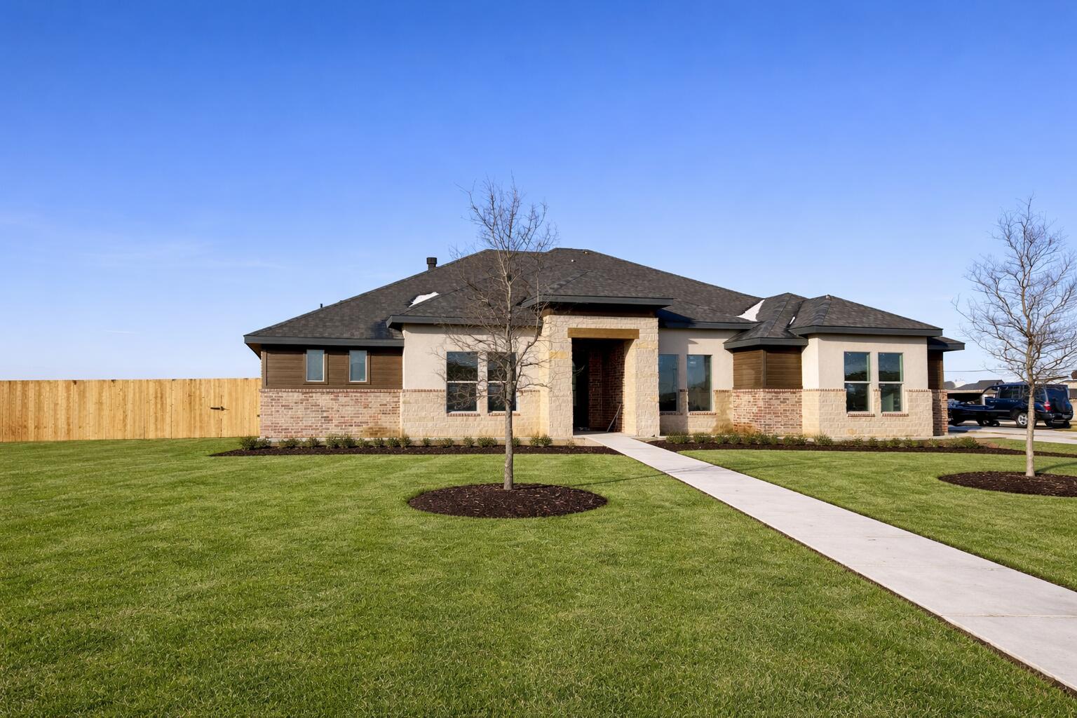 3804 County Road 7665 Lubbock, TX 79424 - Photo 3 of 4 a front view of a house with a yard
