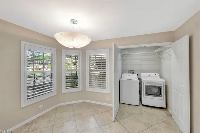 a view of a storage & utility room with washer and dryer