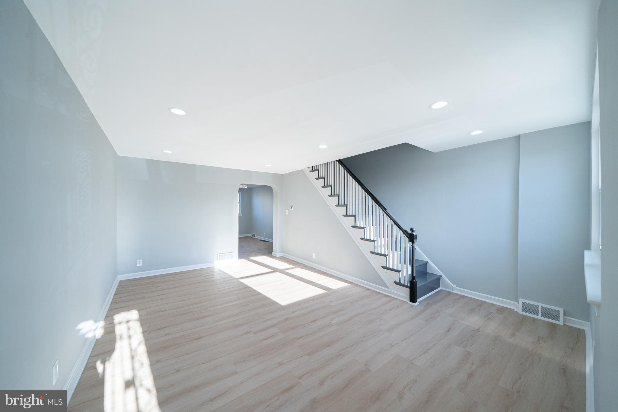 8659 Fayette Street Philadelphia, PA 19150 - Photo 13 of 47 a view of an empty room with wooden floor