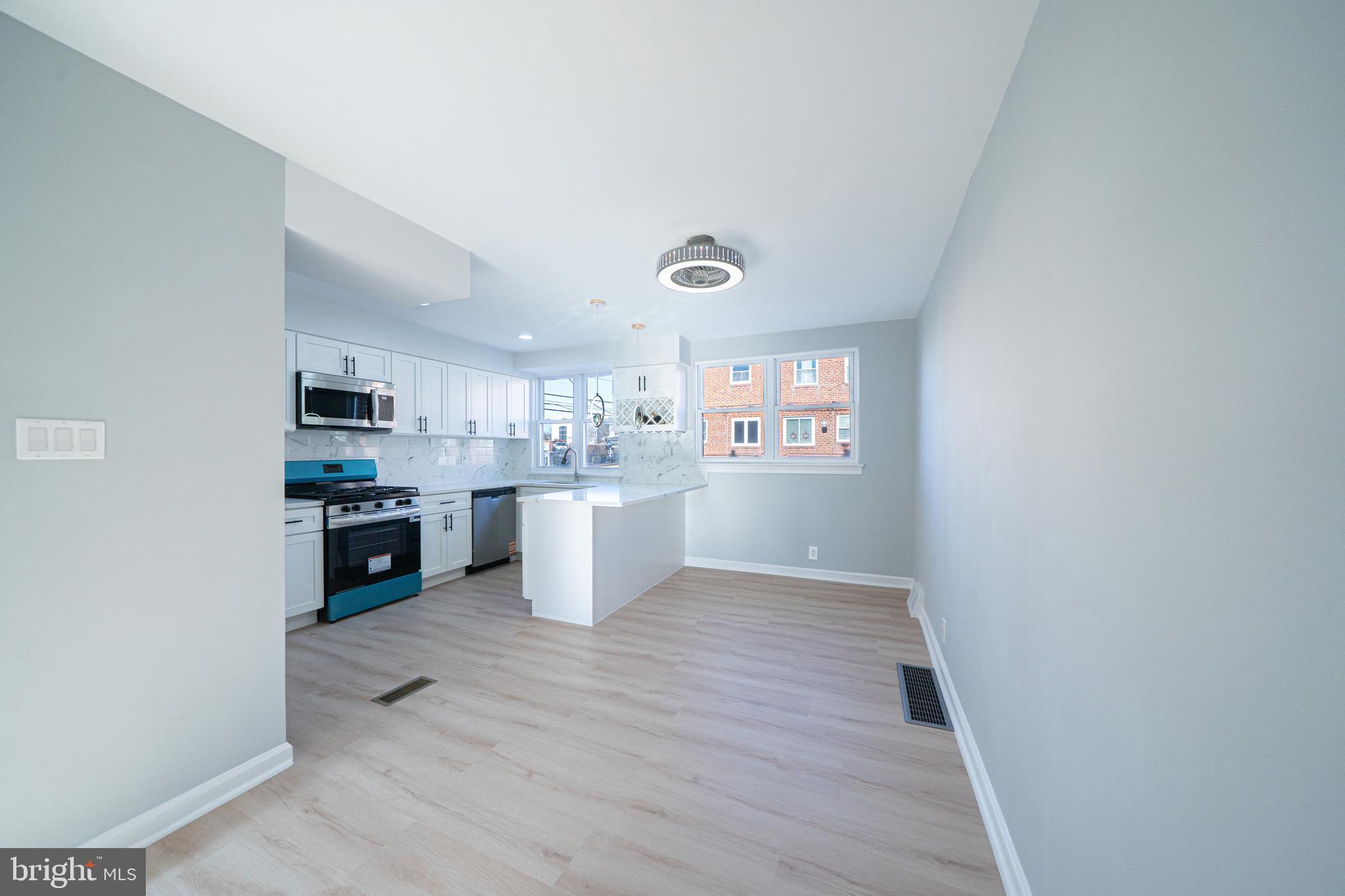 8659 Fayette Street Philadelphia, PA 19150 - Photo 17 of 47 a view of a kitchen and an empty room