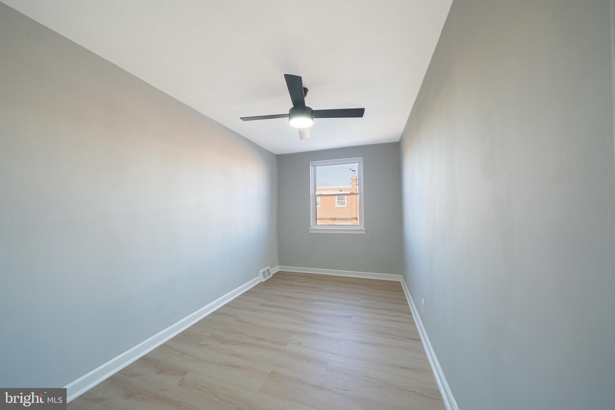 8659 Fayette Street Philadelphia, PA 19150 - Photo 28 of 47 an empty room with a window and a fan
