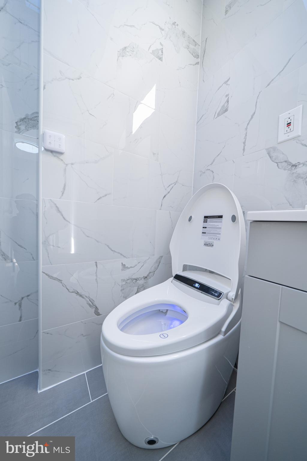 8659 Fayette Street Philadelphia, PA 19150 - Photo 31 of 47 a bathroom with a sink and mirror