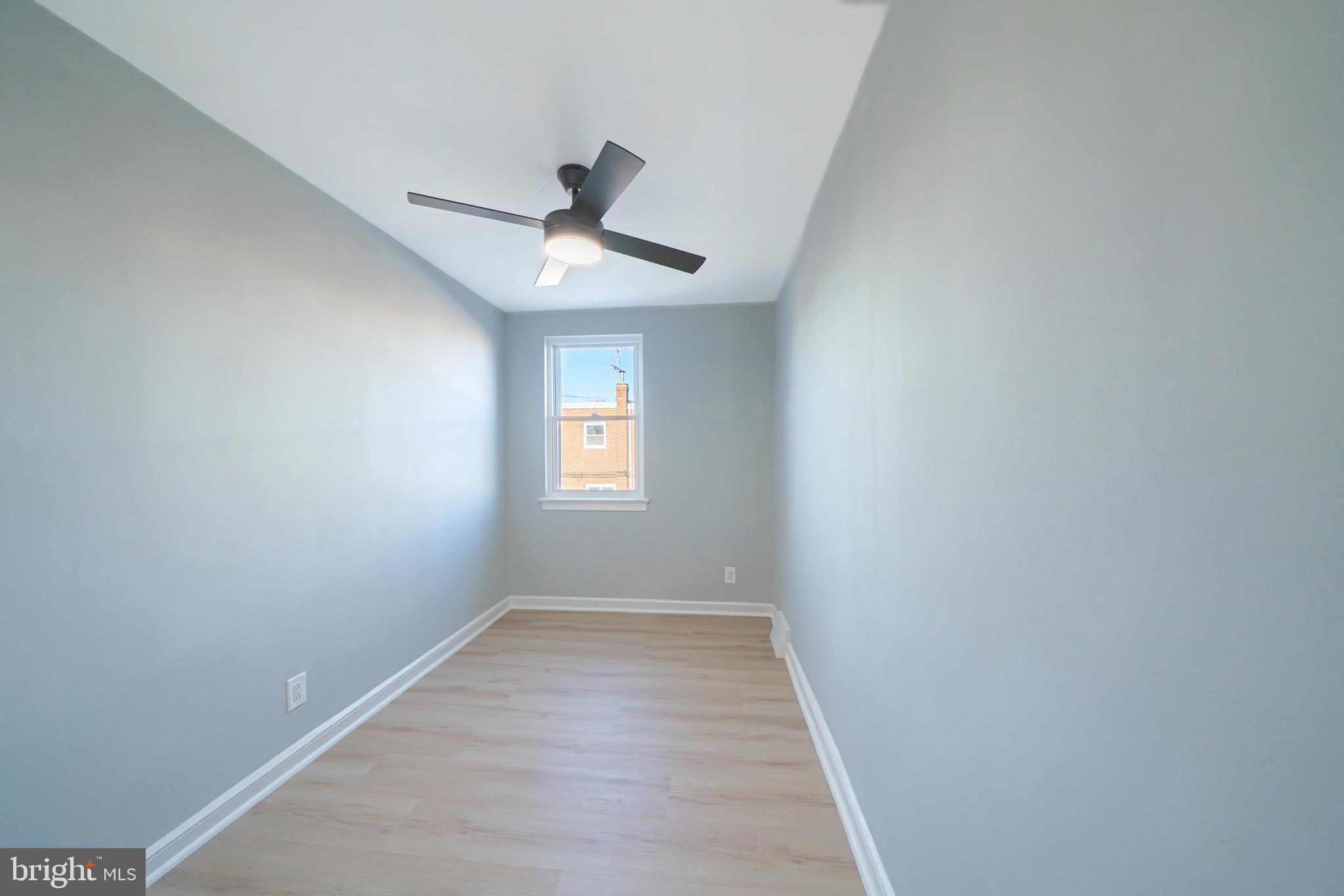 8659 Fayette Street Philadelphia, PA 19150 - Photo 33 of 47 a view of empty room with wooden floor and fan