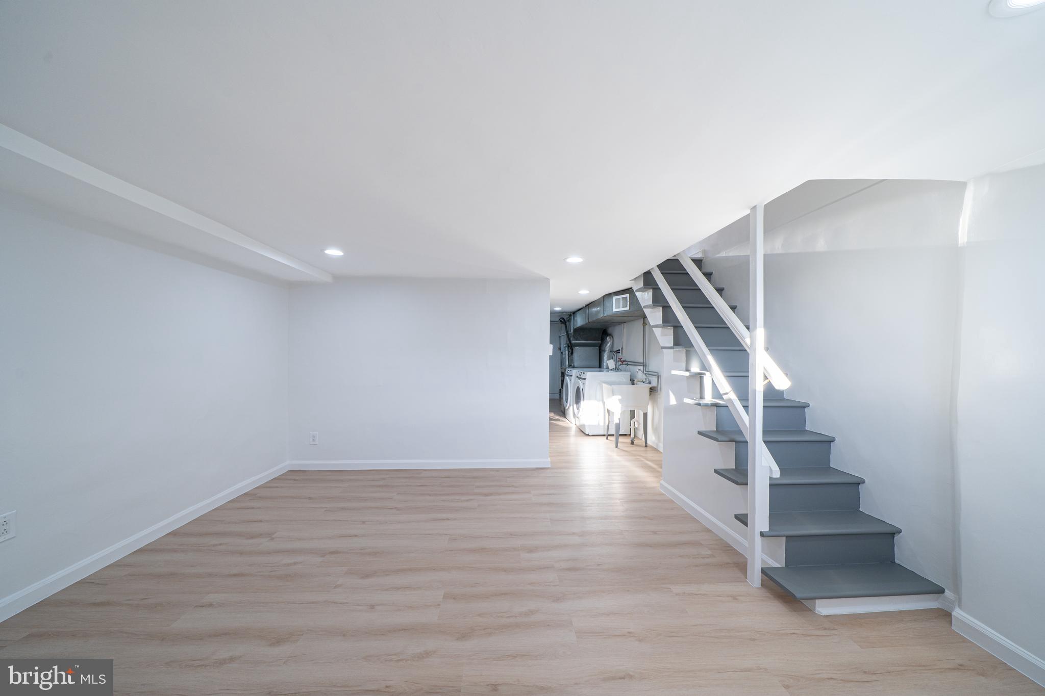 8659 Fayette Street Philadelphia, PA 19150 - Photo 35 of 47 a view of entryway and hall with wooden floor