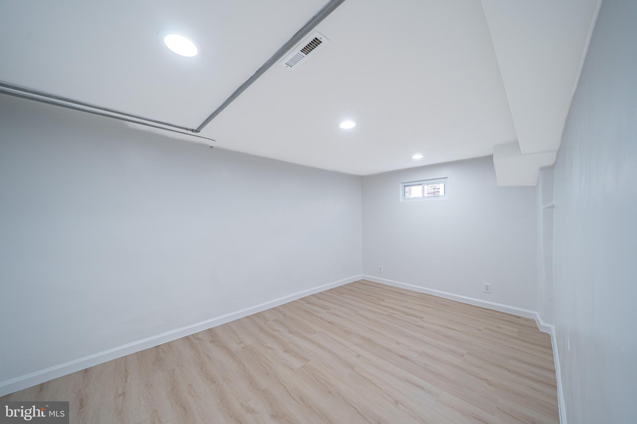 8659 Fayette Street Philadelphia, PA 19150 - Photo 41 of 47 wooden floor in an empty room