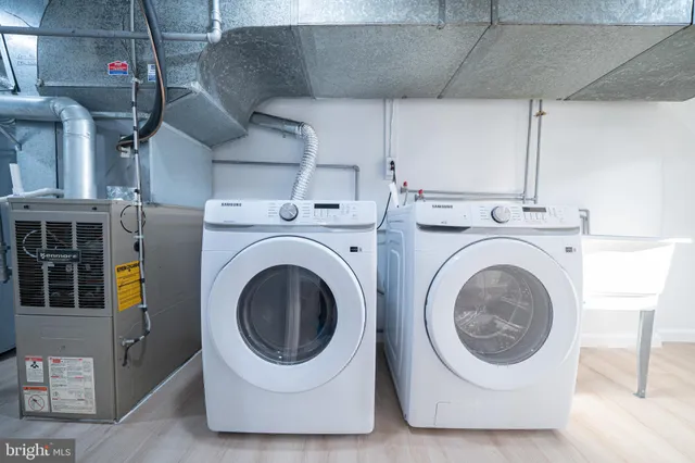 a utility room with dryer and washer