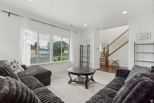 1585 South 910 West Payson, UT 84651 - Photo 5 of 32 Bright living area featuring a large picture window, recessed lighting, and light-toned carpeting