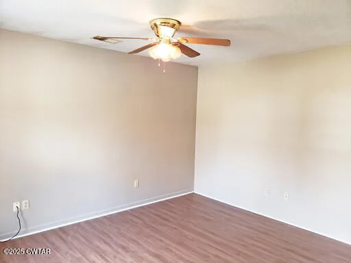 a view of small space with wooden floor
