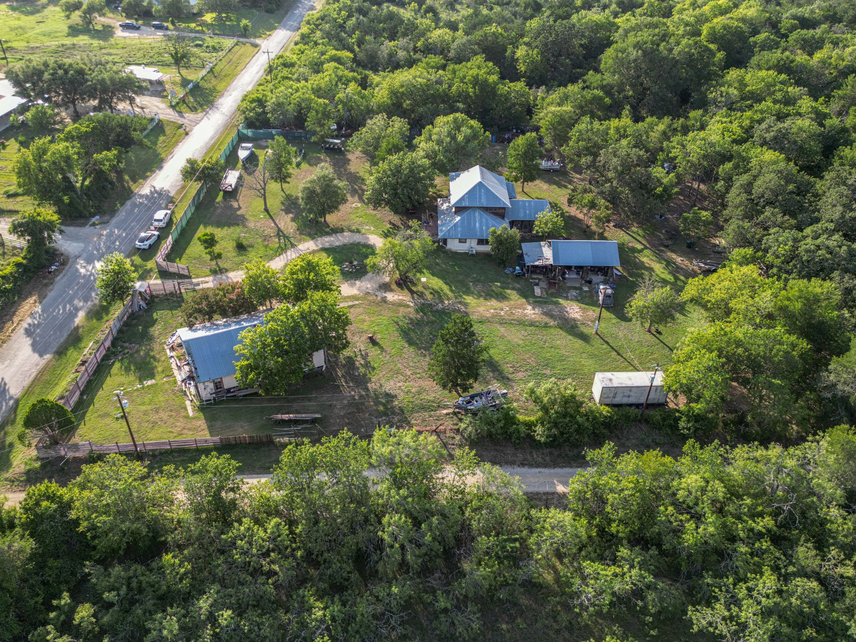 368 Lytton Lane Dale, TX 78616 - Photo 4 of 29 View of property location featuring a heavily wooded area