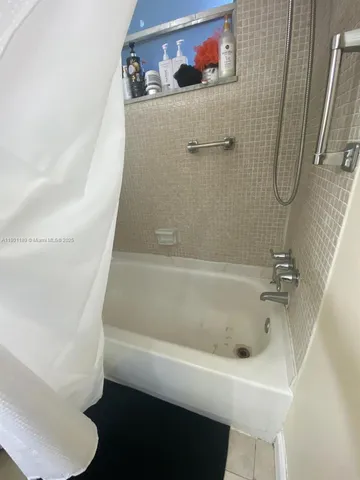 a bathroom with a bathtub