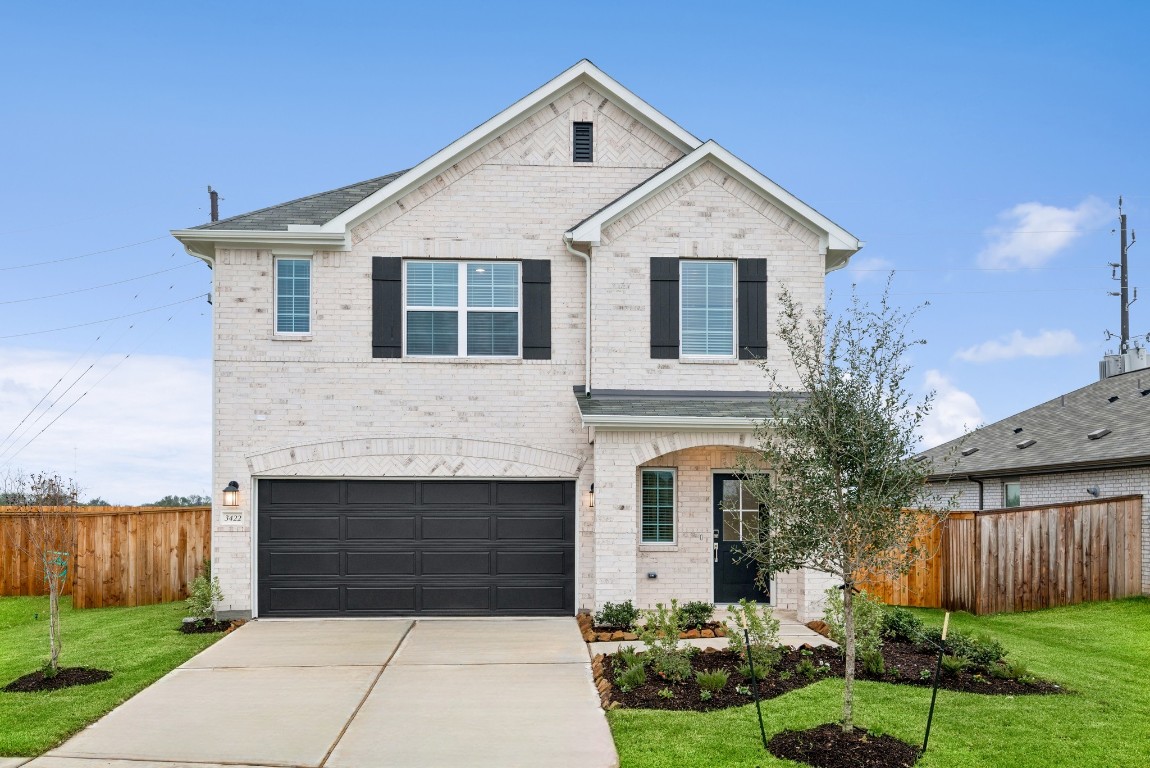 3422 Fresh Bluestream Lane Rosenberg, TX 77471 - Photo 19 of 48 a front view of a house with garden