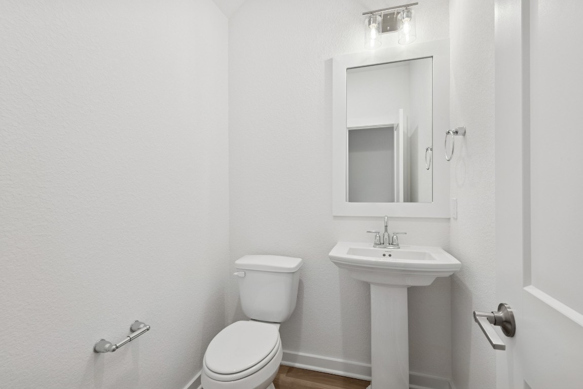 3422 Fresh Bluestream Lane Rosenberg, TX 77471 - Photo 20 of 48 a bathroom with a sink toilet and mirror