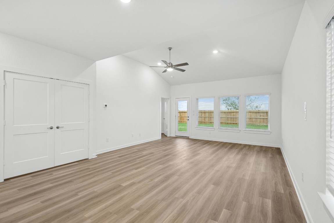 3422 Fresh Bluestream Lane Rosenberg, TX 77471 - Photo 29 of 48 wooden floor in an empty room with a window