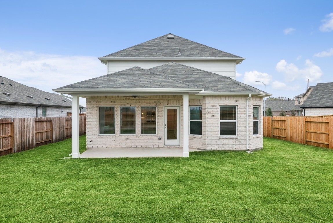 3422 Fresh Bluestream Lane Rosenberg, TX 77471 - Photo 42 of 48 a front view of a house with a yard