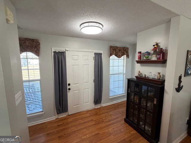 104 Tyler Court Macon, GA 31216 - Photo 22 of 33 a view of livingroom with furniture and wooden floor