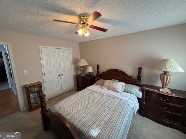 104 Tyler Court Macon, GA 31216 - Photo 29 of 33 a bedroom with a bed and a chandelier