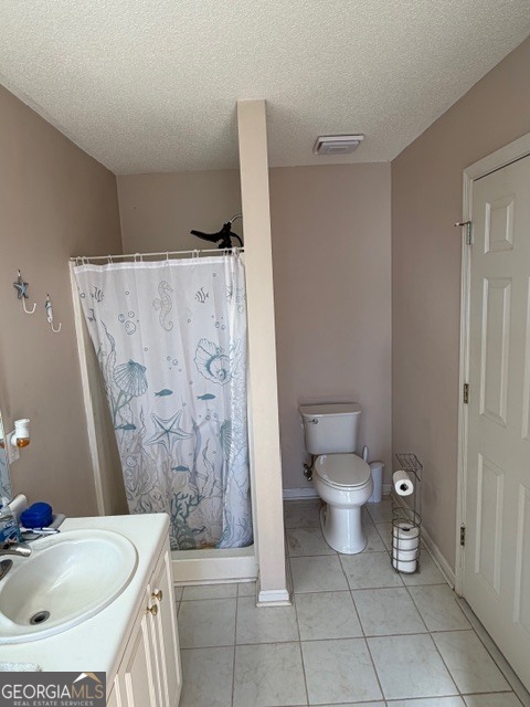 104 Tyler Court Macon, GA 31216 - Photo 33 of 33 a bathroom with a granite countertop sink a toilet and a mirror