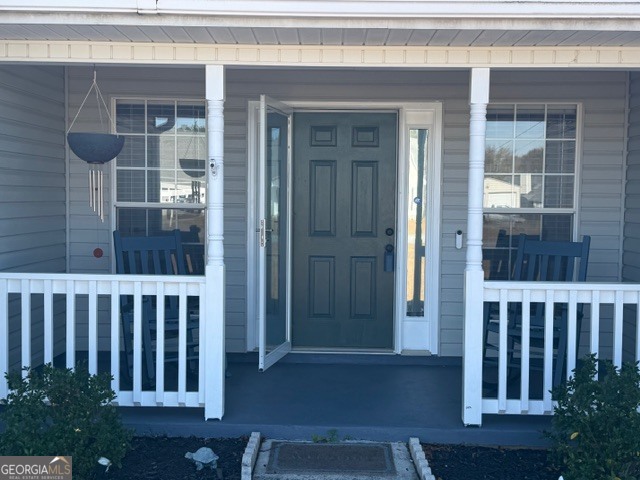 104 Tyler Court Macon, GA 31216 - Photo 5 of 33 a view of porch with a chair