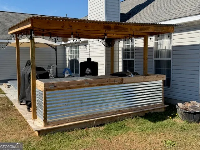 a view of a balcony with chairs and floor