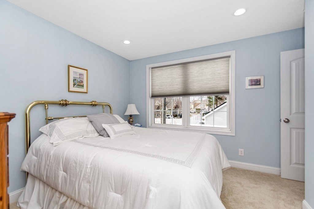 2a Ferry Road, Unit B Salisbury, MA 01952 - Photo 15 of 22 a bedroom with a bed and a window