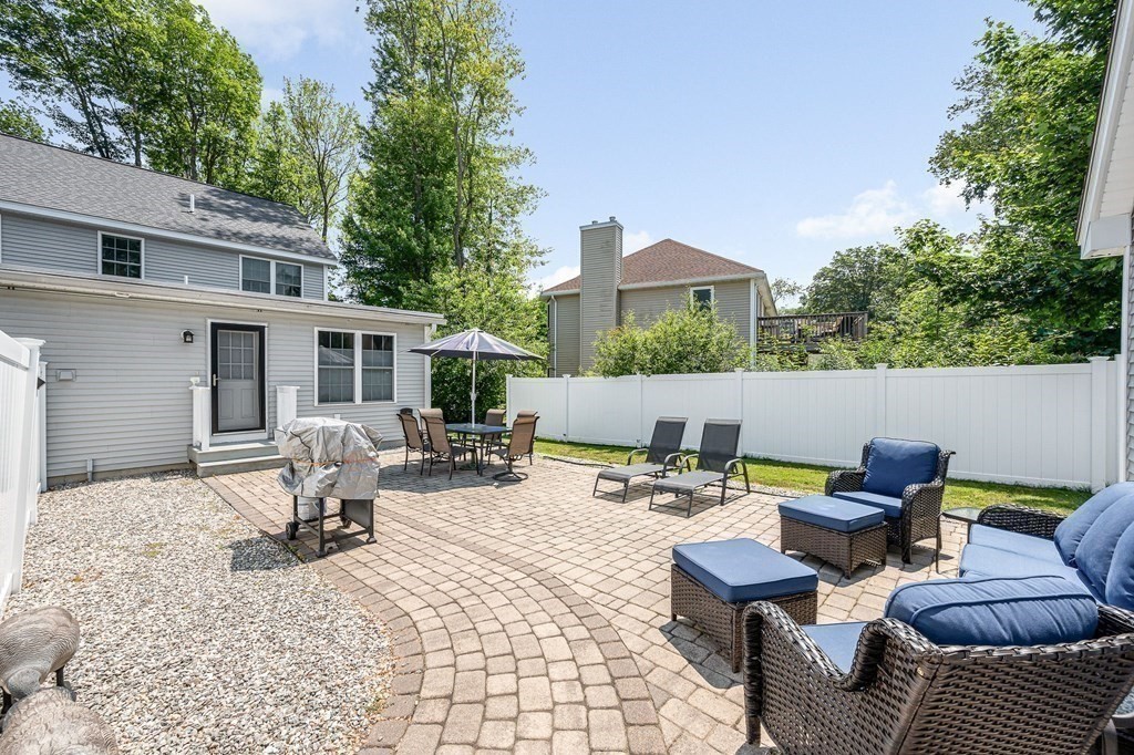 2a Ferry Road, Unit B Salisbury, MA 01952 - Photo 18 of 22 a view of a patio with a dining table and chairs