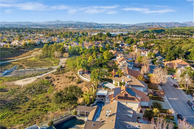 an aerial view of residential building with parking space