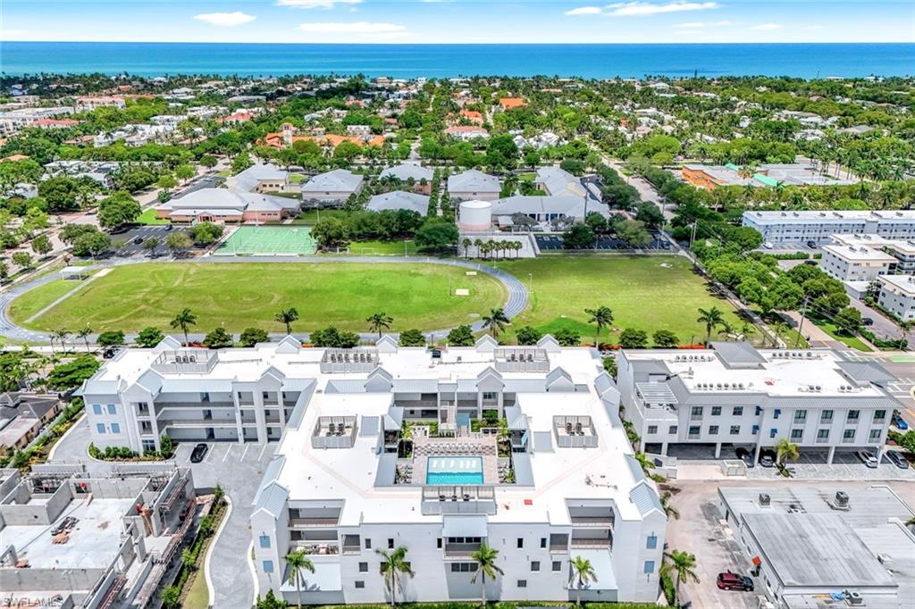 201 8th Street South, Unit 308 Naples, FL 34102 - Photo 27 of 28 a picture of city view with lake view and mountain view